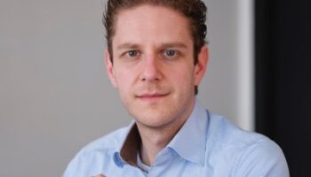 A headshot of Alex de Vries-Gao, PhD candidate at VU Amsterdam.