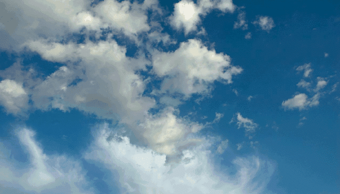 A title image of bright blue skies, filled with assorted clouds.